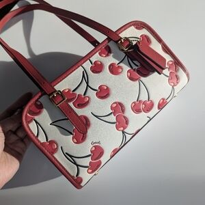 NWT COACH Cherry Swing Zip